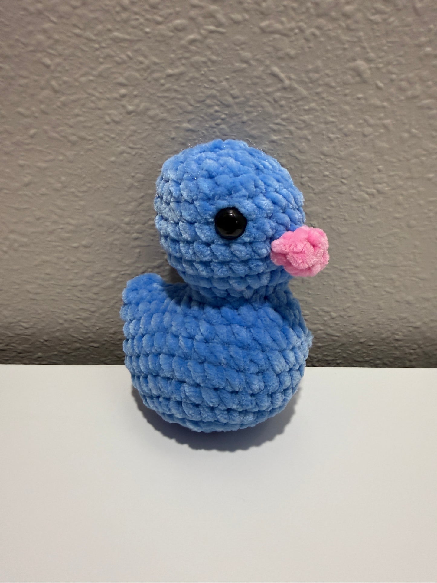 Blue crochet on a neutral background