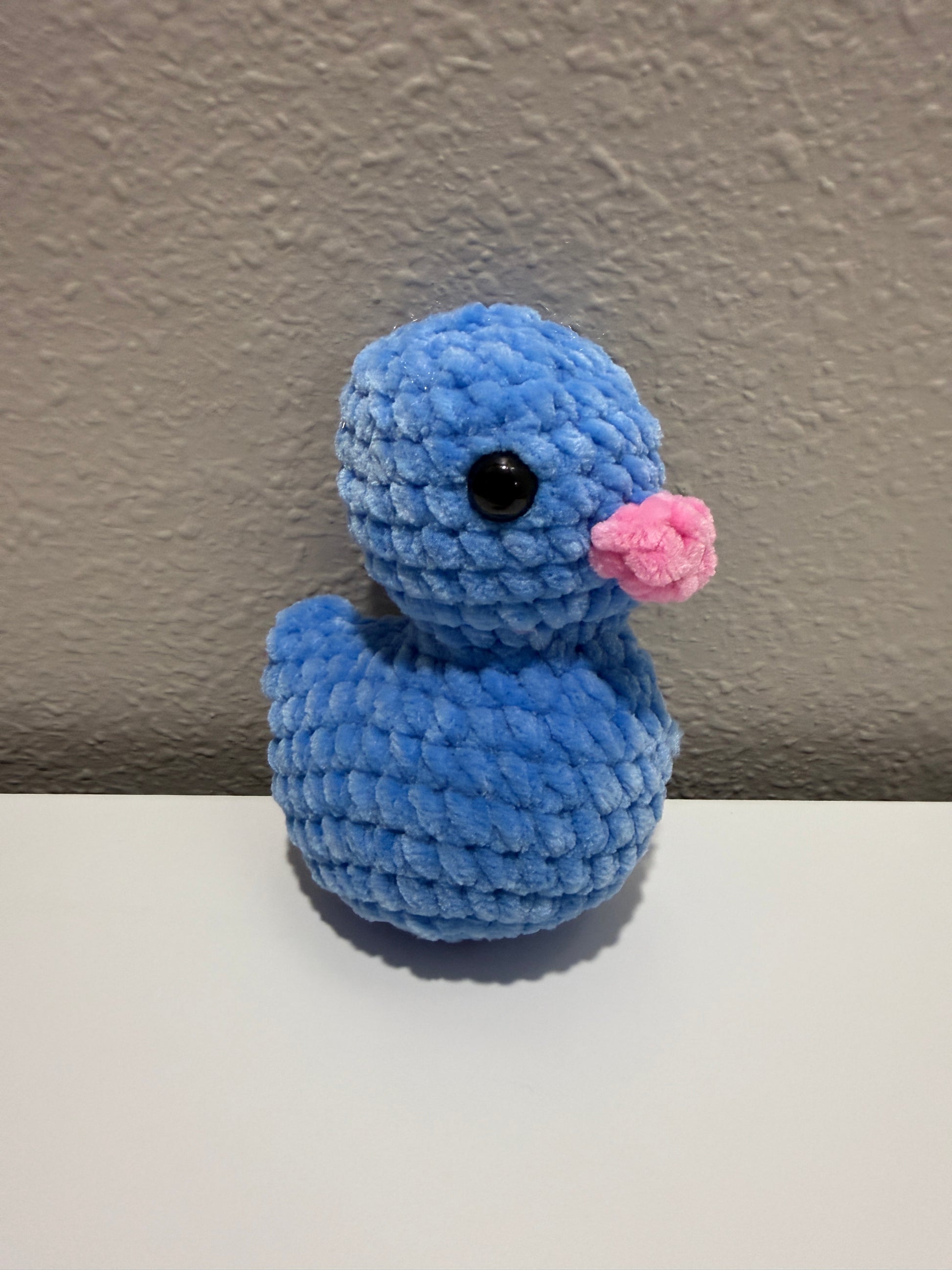 Blue crochet on a neutral background